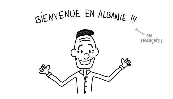 Dessin : homme qui nous souhaite la bienvenue en Albanie en français